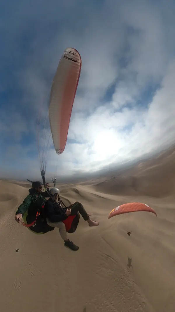 Recuerdo del vuelo tándem sobre el oasis